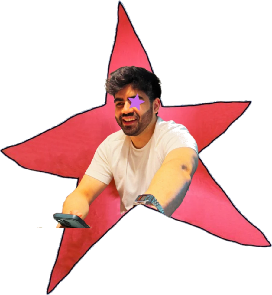 Shrey Mehra inside a hand-drawn red star, taking the photograph himself