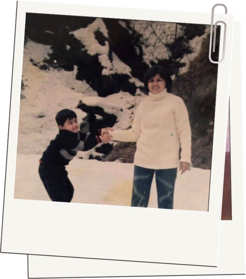 Shrey as a boy with his mother in the snow
